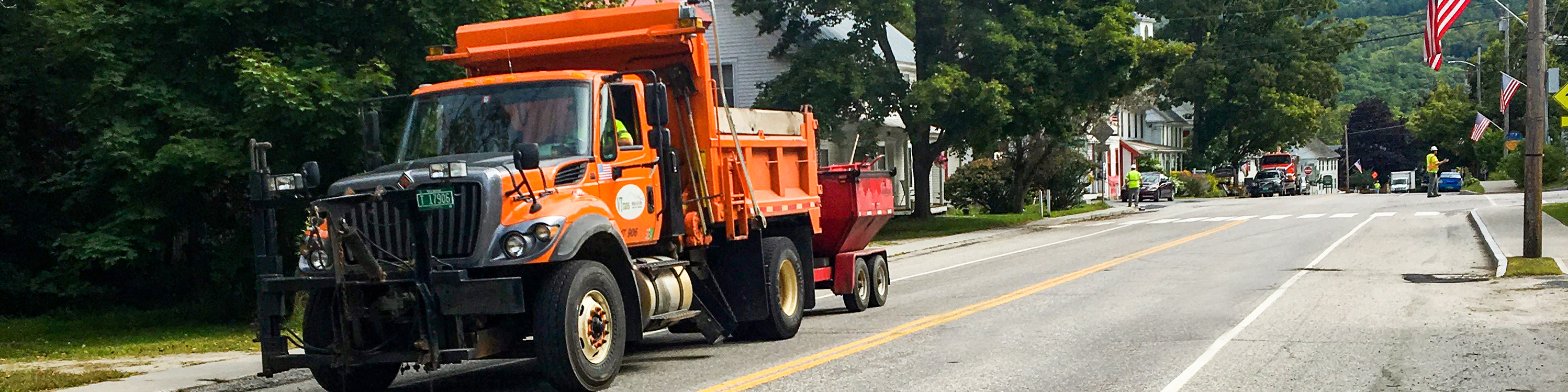 The Agency of Transportation Dump Truck on a state road