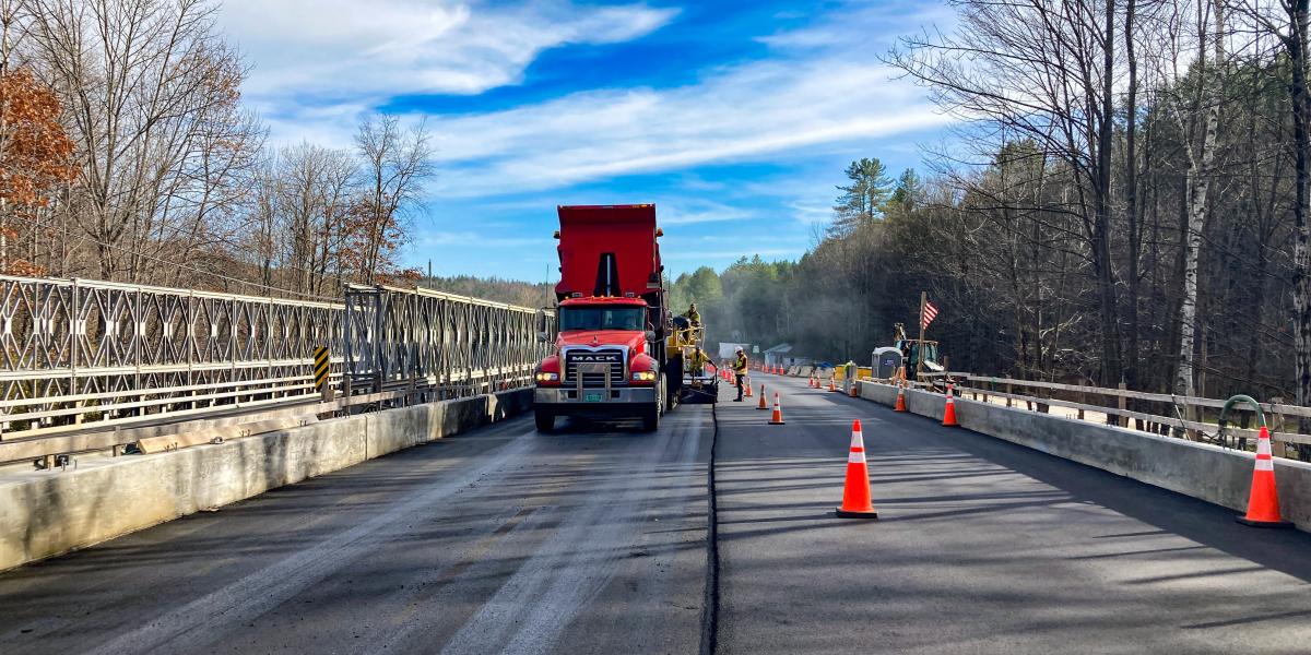 Paving work on the bridge replacement project along VT Route 103 in Chester, VT.