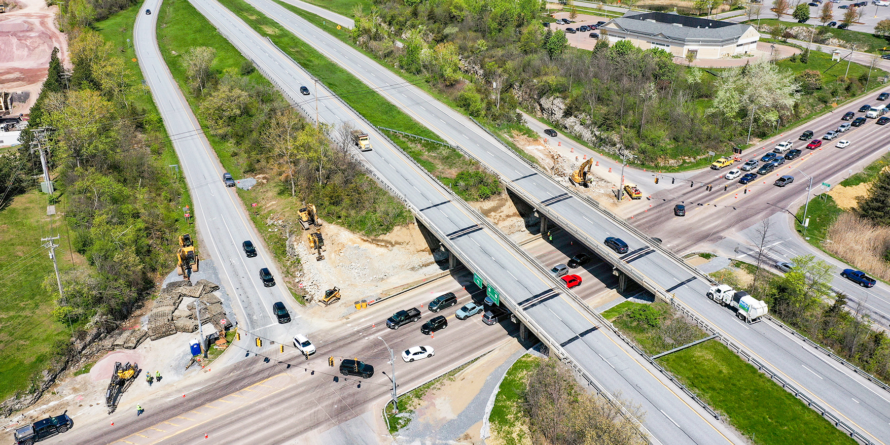 A bird's-eye view above the Exit 16 Diverging Diamond Interchange project with blasting efforts underway long the U.S. 2/7 corridor in Colchester.