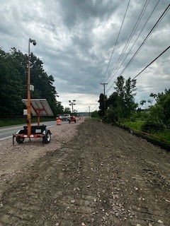 Crews conduct work to widen the roadway along U.S. 7 in Colchester, VT.