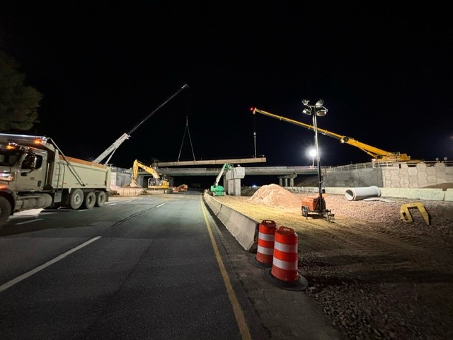 Crews install structural steel girders for the new U.S. 2 bridge over I-89 in Colchester, VT. 