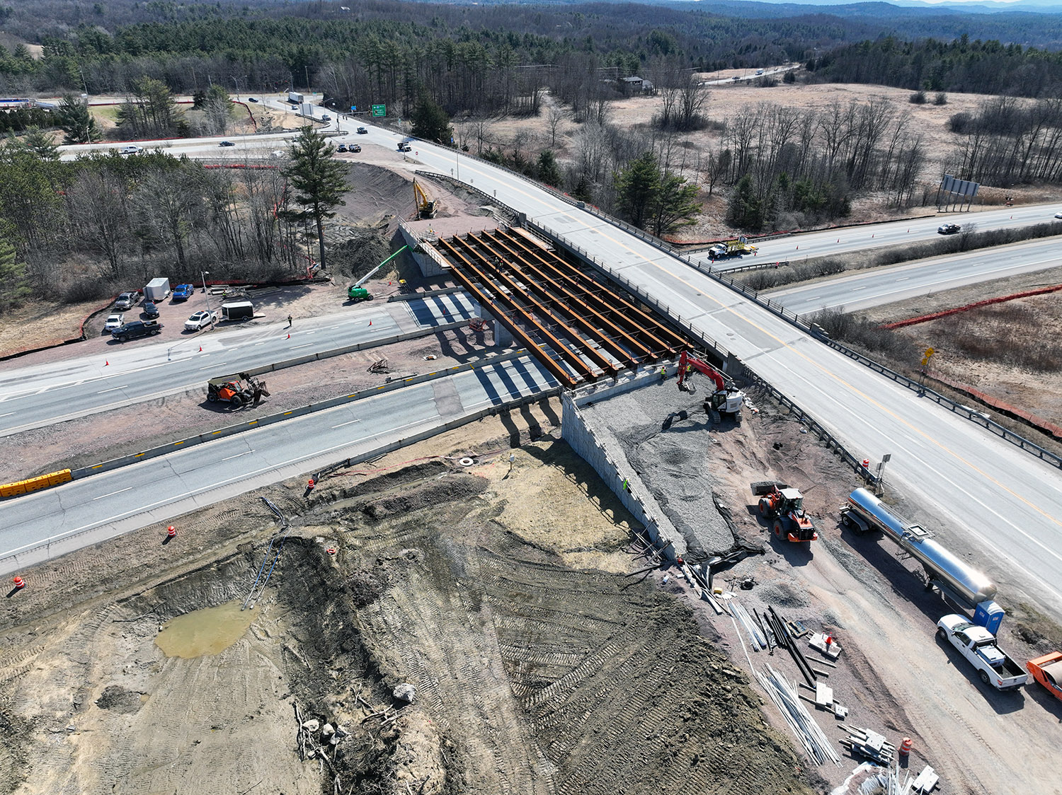 An aerial photo of crews constructing the western approach to the new U.S. 2 bridge in Colchester, VT.