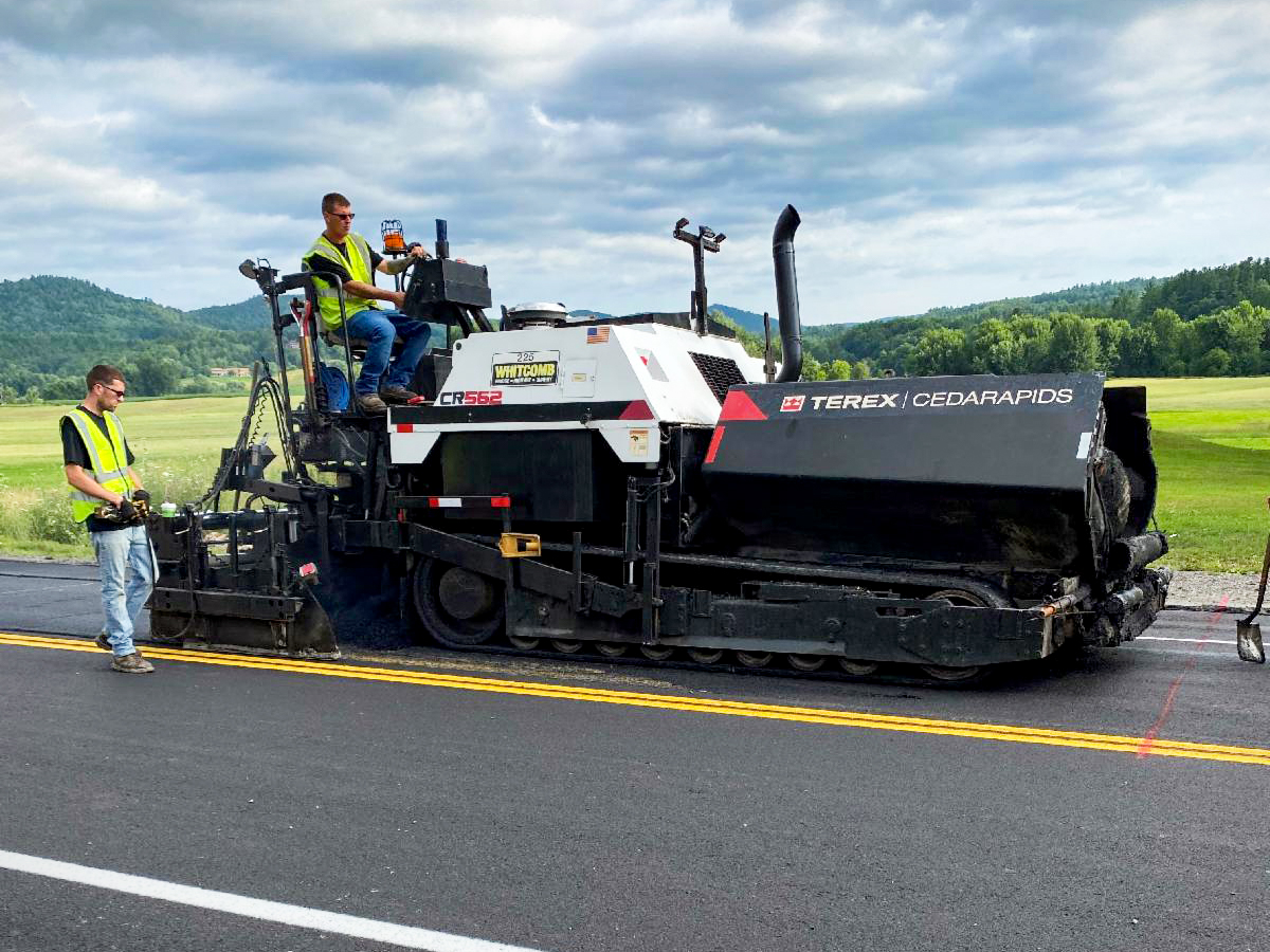 A roller paves along VT Route 15