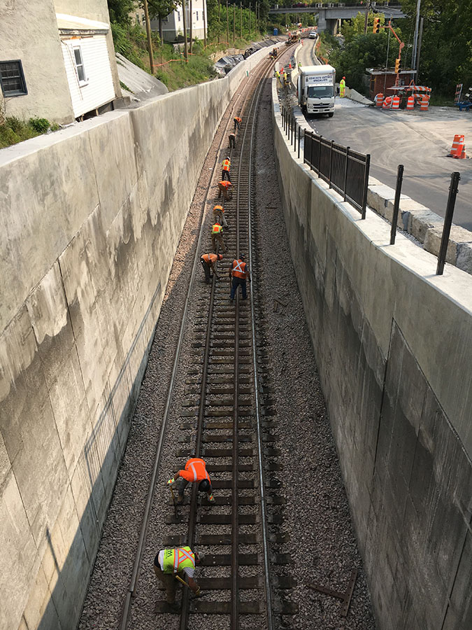 Workers on rail